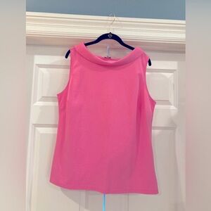 Cowl neck sleeve less pullover blouse with side darts in bright pink.